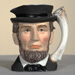 a mug made in the image of abe lincoln's head