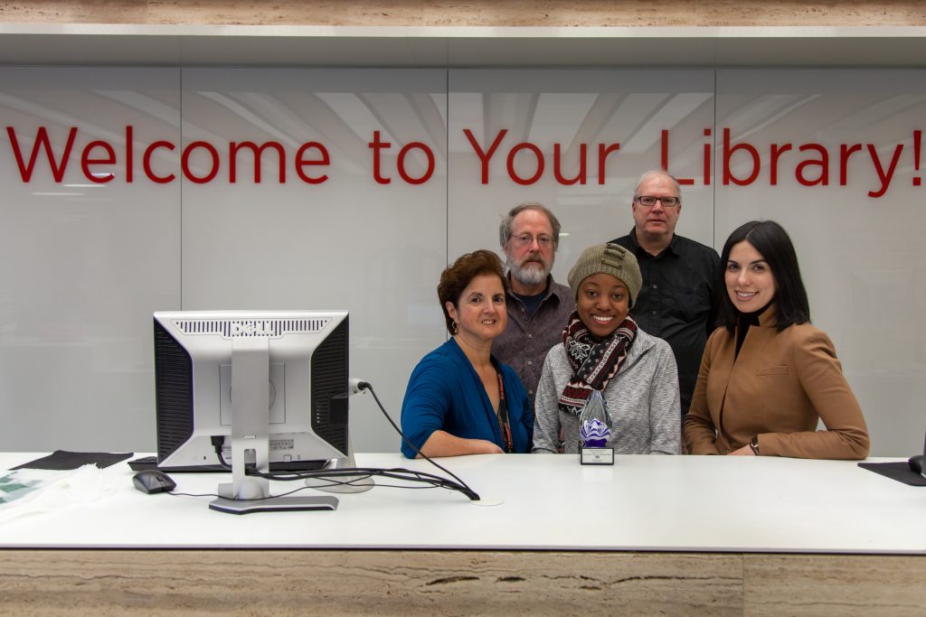 staff members at the Rock circ desk