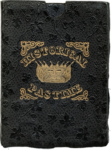Black damask case with grape patterns. Gilt central title with flags in the middle.