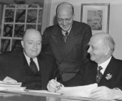 Professor Jacob D. Tamarkin from Russia, Professor Willy Prager from Germany, and Dean Roland G. D. Richardson of the Brown Graduate School.