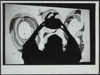 Photo of Fernando Birri during the installation or performance for *Fernando Birri: Ars Magna Lucis et Umbrae*, Osnabrück: European Media Art Festival, 1992. 