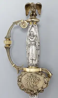 Ceremonial Civil War-era Tiffany sword presented in May 1863 to Col. Rush Hawkins, who led the 9th New York Volunteers — “Hawkins’ Zouaves” — during the first two years of the Civil War. The sword includes a figure of a Zouave carved into the grip and a list of the 9th New York Volunteers’ battles inscribed along the blade.