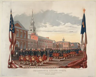 Zouave regiment marching through city street; framed by flags at right and left sides; men (including a Mason), women and child watching