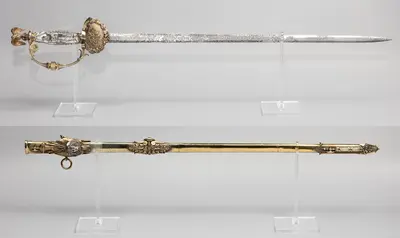 Ceremonial Civil War-era Tiffany sword presented in May 1863 to Col. Rush Hawkins, who led the 9th New York Volunteers — “Hawkins’ Zouaves” — during the first two years of the Civil War. The sword includes a figure of a Zouave carved into the grip and a list of the 9th New York Volunteers’ battles inscribed along the blade.