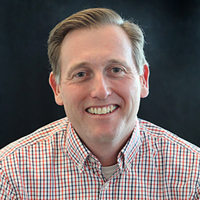 headshot of Erich van Rijn