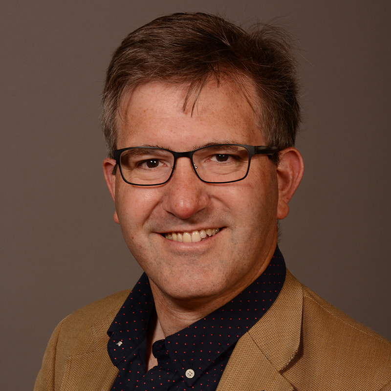 headshot of Charles Watkinson