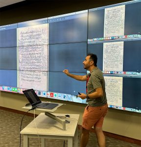 NEH 2024 cohort member Sadegh Ansari giving a presentation